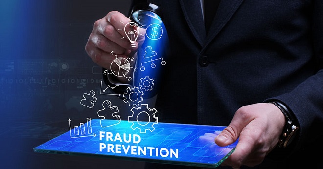 iovation - Business, Technology, Internet and network concept. Young businessman working on a virtual screen of the future and sees the inscription: Fraud prevention