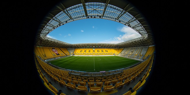 Germany - 12 March 2020, Saxony, Dresden: Football: 2nd Bundesliga, SG Dynamo Dresden. View into the empty Rudolf-Harbig-Stadium. Numerous football matches in Germany and Europe are currently taking place without spectators. It is not yet clear whether so-called "ghost games" will also take place here because of the new corona virus. Photo: Robert Michael/dpa-Zentralbild/dpa - IMPORTANT NOTE: In accordance with the regulations of the DFL Deutsche Fußball Liga and the DFB Deutscher Fußball-Bund, it is prohibited to exploit or have exploited in the stadium and/or from the game taken photographs in the form of sequence images and/or video-like photo series.