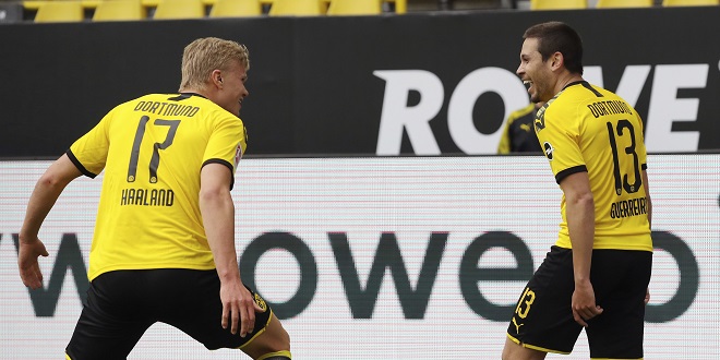Bundesliga - jubilation Raphael GUERREIRO (DO) after his goal for 2: 0, l. Erling HAALAND (DO) Soccer 1.Bundesliga, 26th matchday, Borussia Dortmund (DO) - FC Schalke 04 (GE), on May 16, 2020 in Dortmund / Germany. Photo: Ralf Ibing / firosportphoto / POOL via PHOTO AGENCY SVEN SIMON For journalistic purposes only! Only for editorial use! ## Gemvssvu the requirements of the DFL Deutsche Fuvuball Liga, it is prohibited to use or have in the stadium and / or photos taken from the game in the form of sequence pictures and / or video-like photo series. DFL regulations prohibit any use of photographs as image sequences and / or quasi-video. ## ¬ | usage worldwide