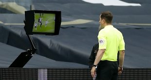 penalties - Referee Peter Bankes checks the VAR pitch side monitor before giving a penalty for a hand ball against Tottenham Hotspur's Eric Dier during the Premier League match at Tottenham Hotspur Stadium, London.