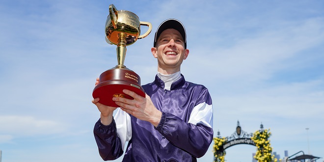 Melbourne Cup - Jockey Jye McNeil holds the Lexus Melbourne Cup after riding Twilight Payment to victory in race 7, The Lexus Melbourne Cup, during Melbourne Cup Day at Flemington Racecourse in Melbourne, Tuesday, November 3, 2020. (AAP Image/Racing Photos, Scott Barbour) NO ARCHIVING, EDITORIAL USE ONLY ** STRICTLY EDITORIAL USE ONLY, NO COMMERCIAL USE, NO BOOKS **