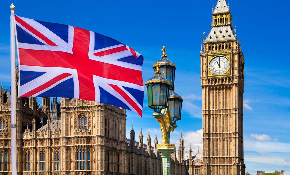 Union flag flying in front of Westminster palace and Big Ben