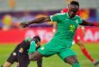 Sadio Mane kicking a ball