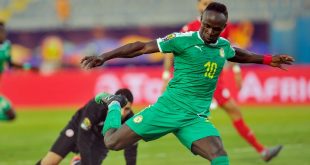 Sadio Mane kicking a ball