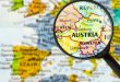 A magnifying glass focusing on Austria