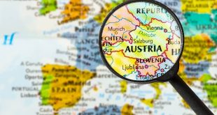 A magnifying glass focusing on Austria