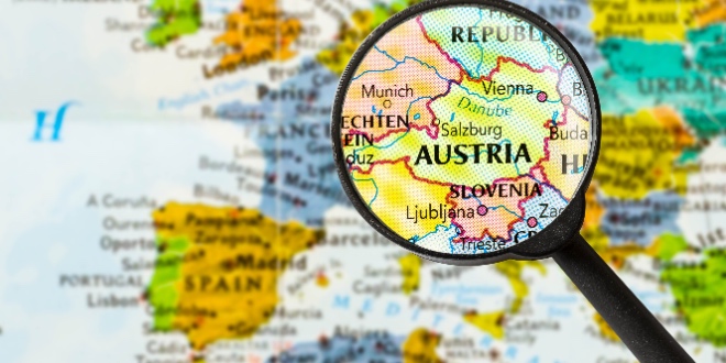 A magnifying glass focusing on Austria