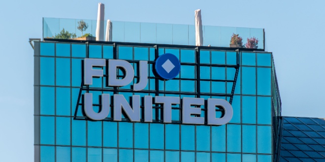 FDJ United's logo on its HQ building