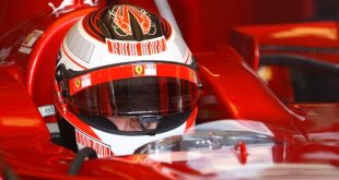 New Paf partner Kimi Räikkönen behind the wheel of a Formula One car
