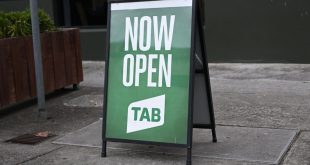 A sign for a retail Tabcorp outlet