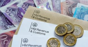An image of HMRC rax forms and pound coins and notes, symbolising betting tax