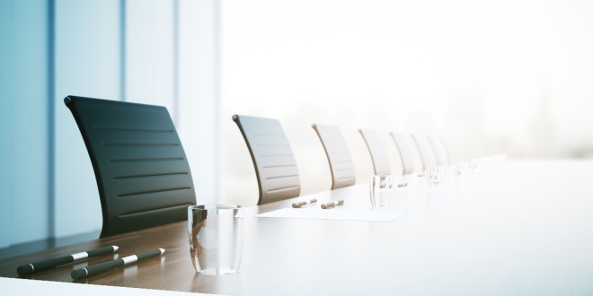 Corporate chairs around a corporate table