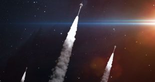 three rockets launching into space