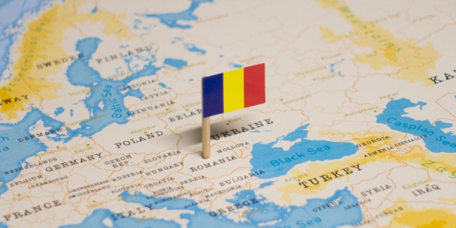 Romania's flag on a map