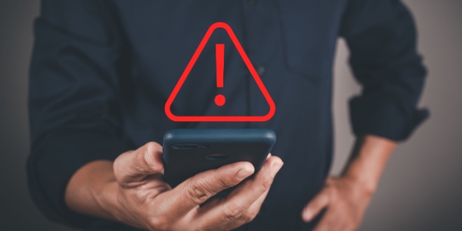 phone with exclamation mark in red