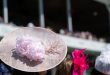 Women in fancy hats at Royal Ascot racecourse