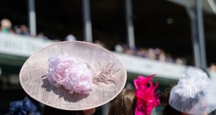 Women in fancy hats at Royal Ascot racecourse