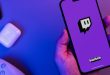 Phone with Twitch on screen