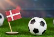 Footballs by Danish flag