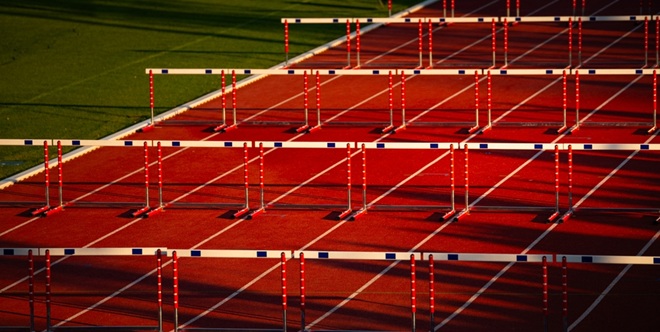 Hurdles concept to illustrate the challenges faced by businesses