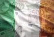 Irish flag with euro banknotes