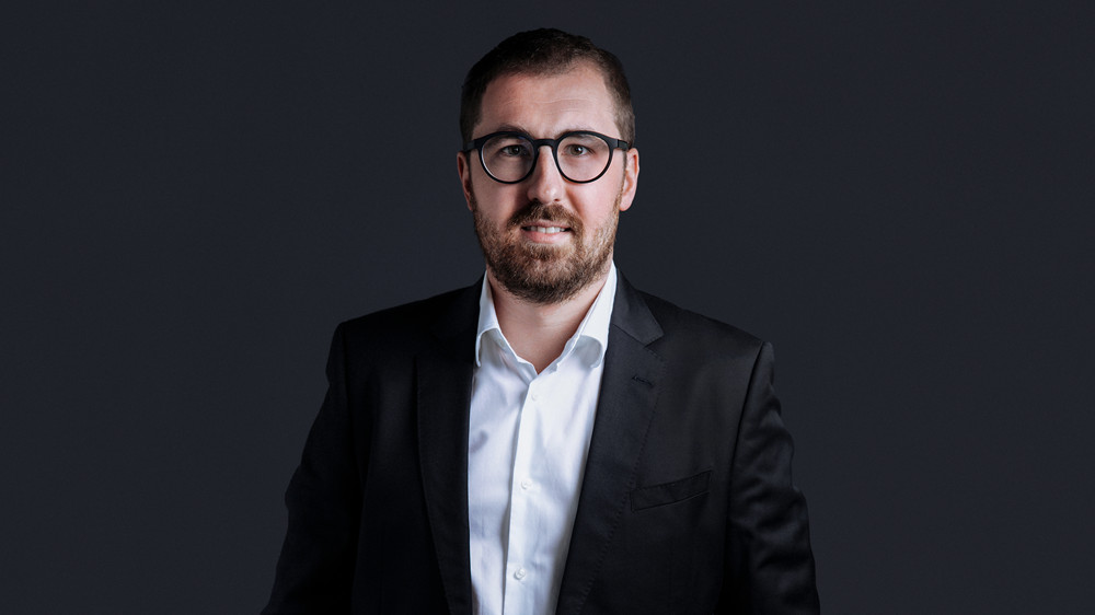 Headshot of Vlad Bondarenko, Head of Product at ReferOn.