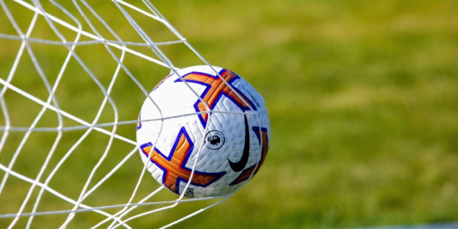Premier League football in a net