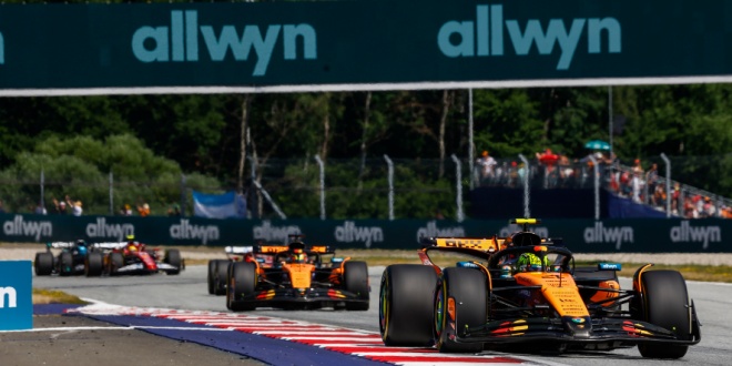 Allwyn branding at an F1 event. The company is a sponsor of both F1 and the McLaren racing team.