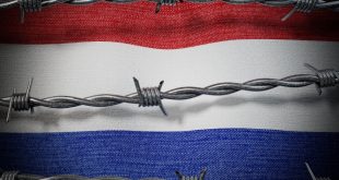 Dutch flag with barbed wire infront