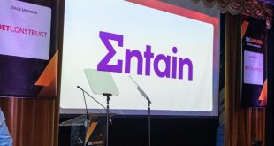 Entain logo displayed at the SBC Summit North America