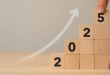 2025 going up in wooden blocks
