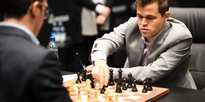 Magnus Carlsen plyaing in a chess game