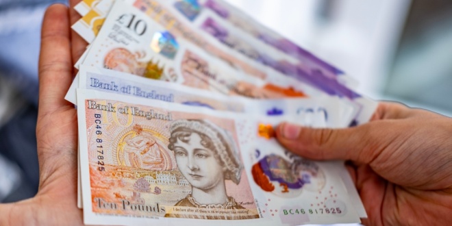 Pound notes being counted, symbolising affordability and deposit limits