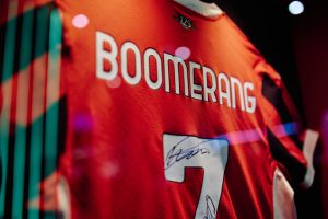 AC Milan's shirt with Boomerang Partners' name on it.