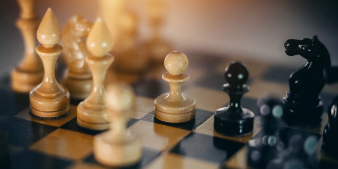 A chess board, symbolic of strategic moves and M&As