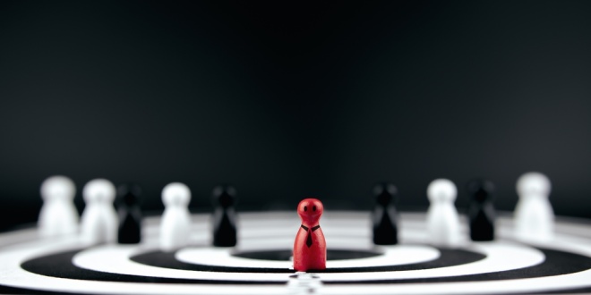 A red figure in the centre of a circle with white ones around, symbolic of leadership - like PointsBet's new CEO