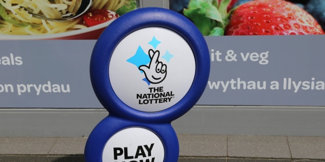 National Lottery sign outside a shop, Desmond having mounted legal challenges against the lottery