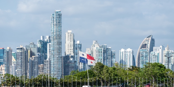 A city landscape with the Panama flag at the forefront