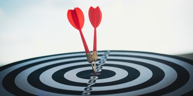 Darts hitting a target, symbolising BETER's ambitions