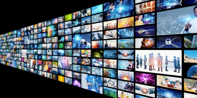 A mass of screens, symbolising the mass media that Betby has taken inspiration from