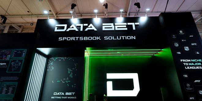 DATA.BET logo at a conference stand