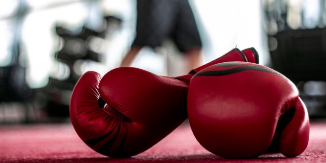 boxing gloves, representing the Gambling Commission stepping up its black market fight