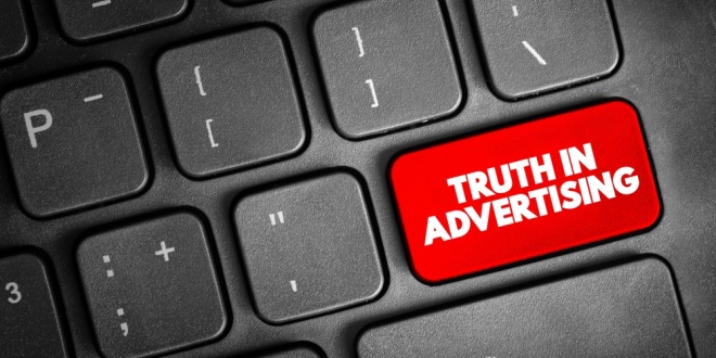 A truth in advertising icon on a keyboard, symbolising ad fraud