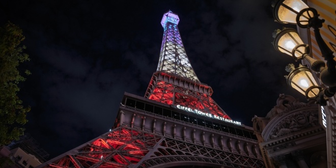 The Eiffel Tower in Paris,i illuminated with the colours of the French flag