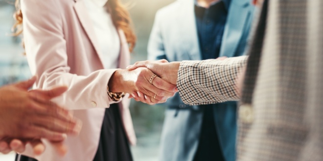 Handshake, representing the BGC hiring a Director of Strategic Delivery