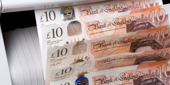 £10 notes in a cash counter, symbolising UK gambling licence fees