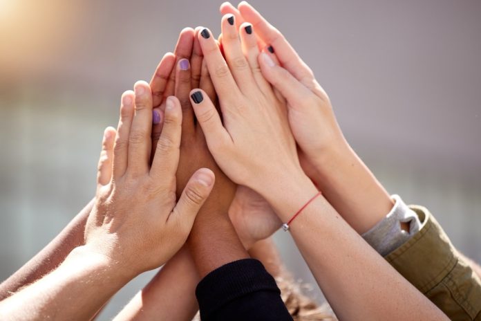 Female hands high fives