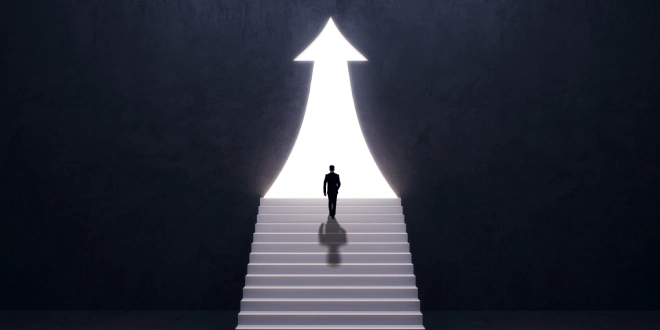 A man going up a stairway, illustrating the growth of Wager Games.