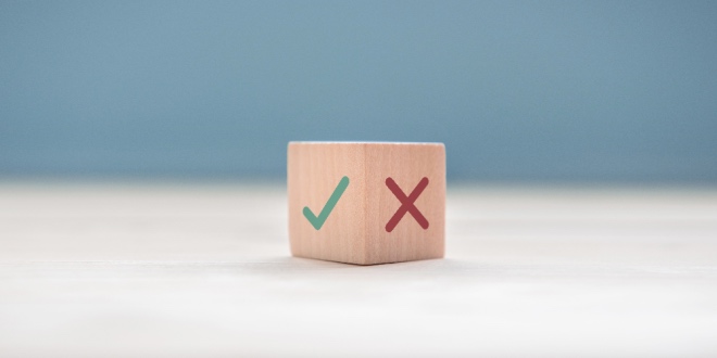 A tick and cross on either side of a box, representing the yes/no markets that predictions like ADI Predictstreet offer