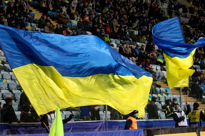 Ukrainian flags waved by football fans